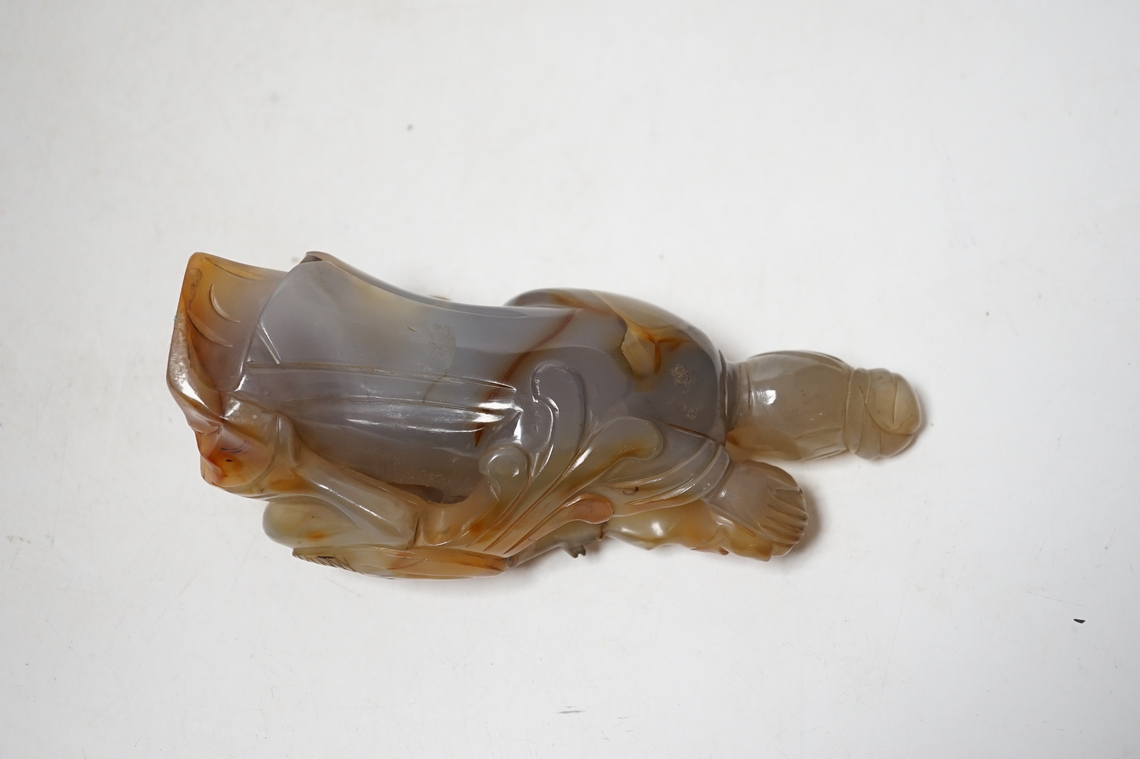 A Chinese carved agate group of Guanyin with a phoenix, 19th century, 17cm high